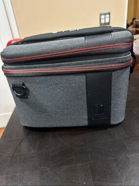 Nintendo Gray Switch Travel Case with Red Zipper Accents